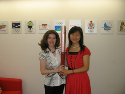 with Olympic torch.JPG