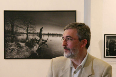 An Artist and his work in background