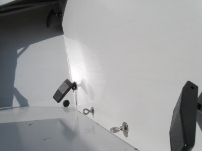 Fourth T-nut app:  ringbolts seal lower edge of frame 12 panel against leakage.