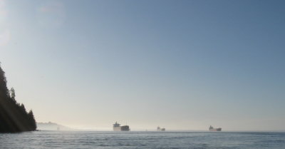 Freighters off Tongue Point, Megler Bridge in the distance.
