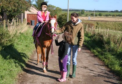 Heather on Millie with Eileen and Tracey