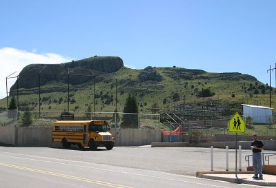 The Wagon Mound in the background is a Connestoga, the one in the foreground is a Wagon Mound, NM school bus.