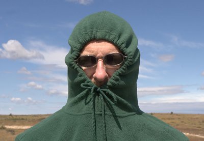 Tom influenced by dinosaur regalia.