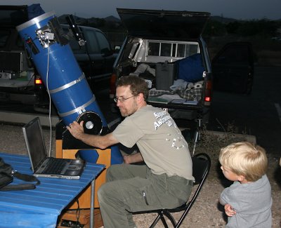 Tom Polakis showing a little guy how to shoot the Moon.