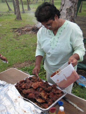 Mom saucing up some chicken