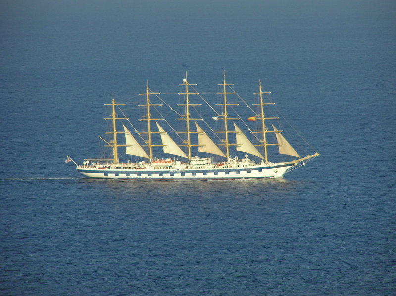 Royal Clipper passes La Mola in the late evening sun