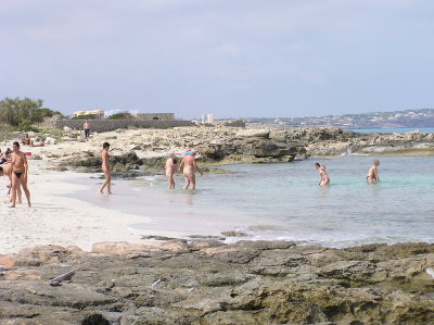 Bathers enjoy the warm sea