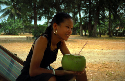 Dao enjoying fresh coconut juice in Na Trang