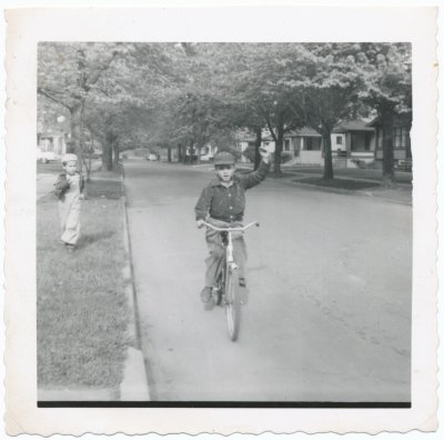 john fitch on bike obeying marys rules spring 1954. Mom supervised bicycle safety @ Col Payne School