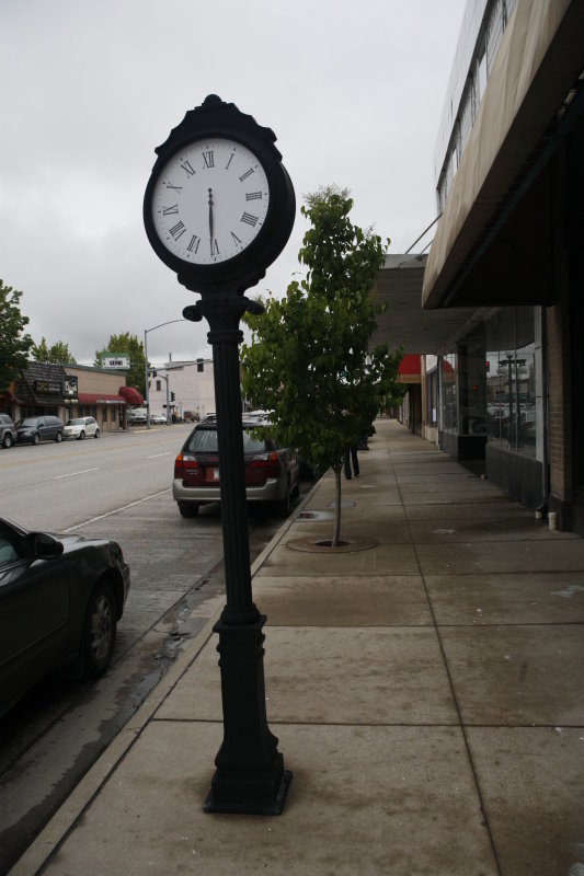 Outside theres a clock on the street.