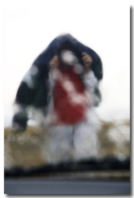 ....it started to rain and we skedaddled! (Liz bundled against the rain thru a wet windshield.)