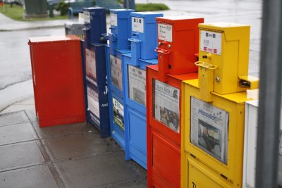 And in the rain these newspaper boxes are colorful!
