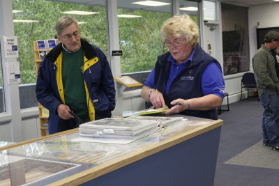 Joan tells Ron of attractions in the area.