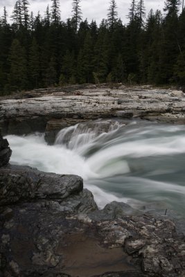 ....down the riverbed and over falls.