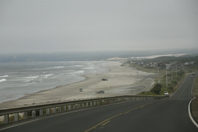 Pacific City beach from the road. Notice the trucks on the beach?
