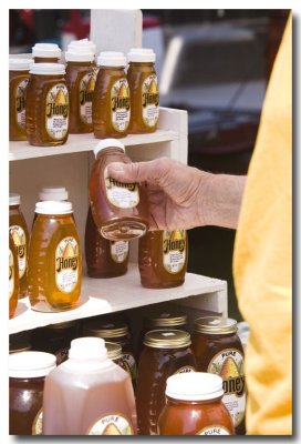 Ron buys honey for his tea. July has begun!