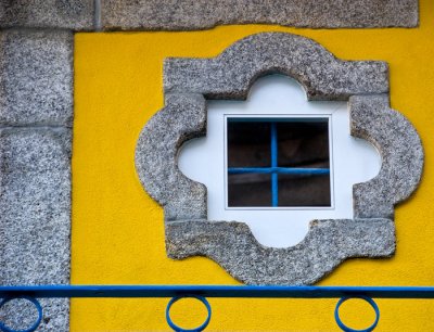 Window in yellow wall