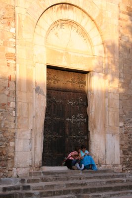 The door of the cathedral which still carries the scars of war