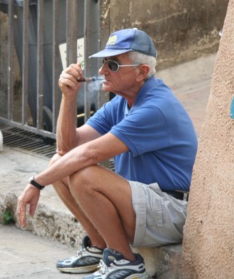 Old frenchman smoking a pipe