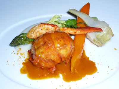 Glazed maine lobster with citrus cauliflower cream and seasonal vegetables