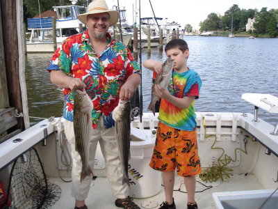 6/29/2008 - Andy & Dad with limit of Stripers and Perch