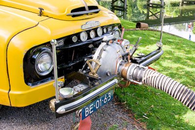 old fire truck pumping water