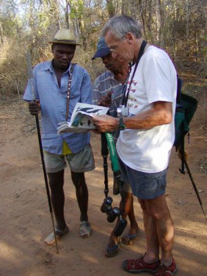 Tony showing local guides his field guide