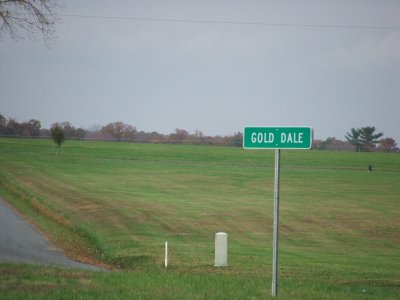 Sign at Gold Dale.  The tracks south of here off of Orange Plank Road.  This was the first station in Orange heading west.