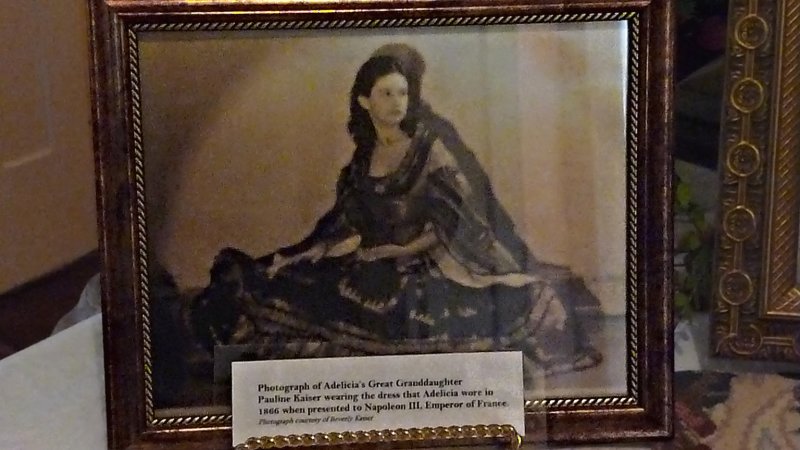 Adelicias great-granddaughter, Pauline Kaiser, wearing the dress that Adelicia wore in 1866 at the court of Napolean III.