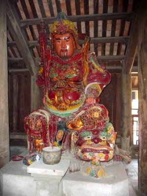 An impressive wooden statue in the main temple complex.