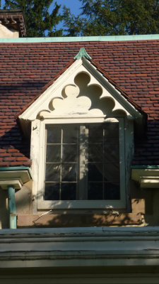 Decorative trim over a second floor window.