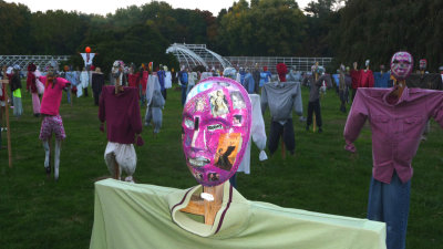 Pictures of famous people were pasted on this pink mask.