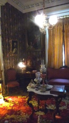 The Ladies Parlor or Tte--Tte Salon. It is a dark room. They kept the curtains drawn probably due to the hot climate.