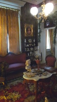 The furniture in this room is not original, although the room is decorated with period pieces of that time.