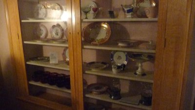 Examples of some of the different sets of china that Adelicia owned are on dislplay in this case.