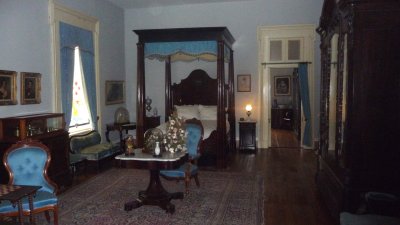 One of 5 bedrooms on the 2nd floor. Only the armoire is original to this room.