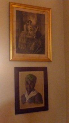 Pictures on the wall in the Nursery.  The lower one is a portrait of Adlelicia's personal maid, Eva Snowden Baker.