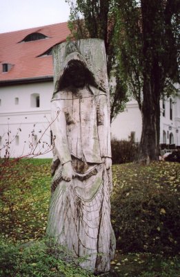 Close-up of the wooden carving which is rather spooky looking.