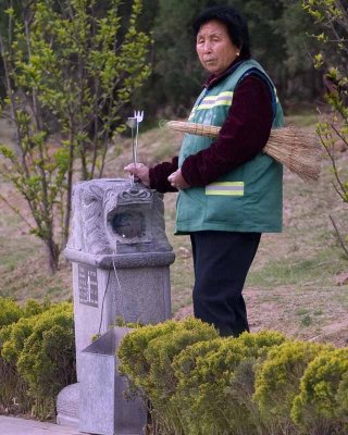 Attendant on Temple grounds