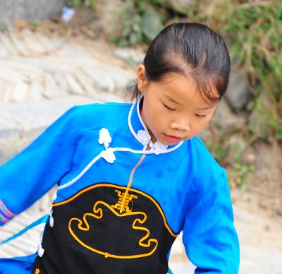 Xijiang Miao Village - Schoolgirl on way home