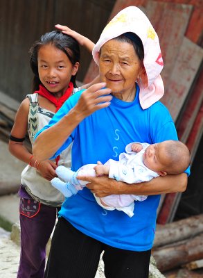 Xijiang Miao Village - Grandma helping out