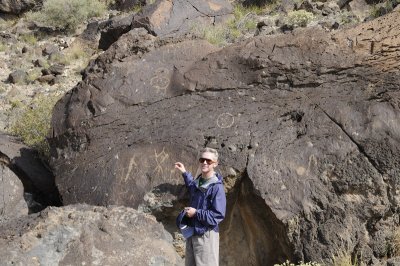 Chris pointing at the real Petroglyphs