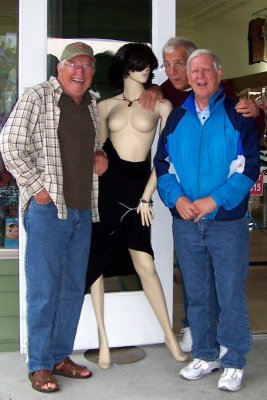 Three old men flirting with the mannequin