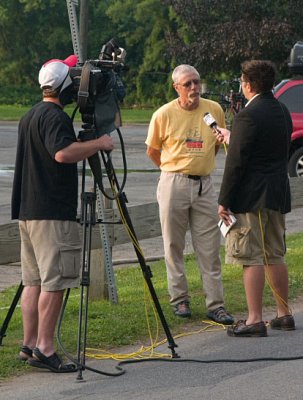 Ride director Al Hastings being interviewed by a local tv crew