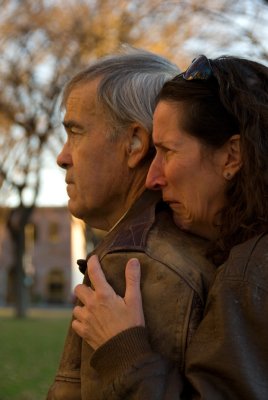 Grieving couple at Vietnam War memorial