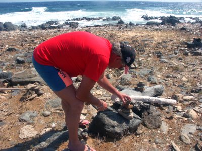 Dave stacking rocks its a tradition on the island - apparently brings good luck