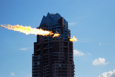 I completely missed the jet but captured the after-burn it looks like the flame is penetrating the building