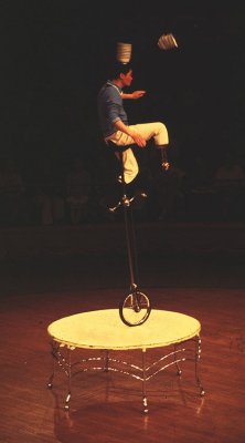 CHINESE ACROBAT: AND, HE CAUGHT THEM!
