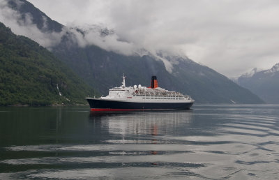 The QEII Visits Geirangerfjord, Norway.