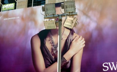 Behind the lamp